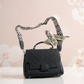 Noir Geometric Embossed Satchel with Silk Accent