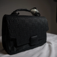 Noir Geometric Embossed Satchel with Silk Accent